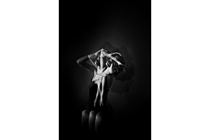 woman touching her head in underwear